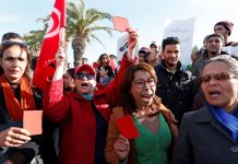 Tunisia austerity protests go on amid wave of arrests