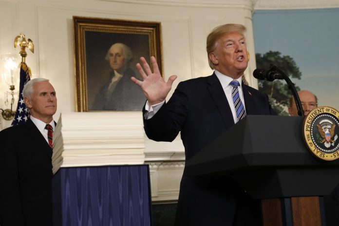 trump-signs-1-3-trillion-spending-bill-with-a-warning.jpg