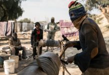 Illicit gold trade fuels conflict in South African mining town