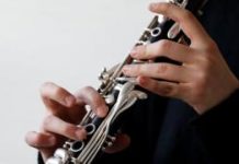 Canadian clarinet player sues ex for deleting his scholarship offer