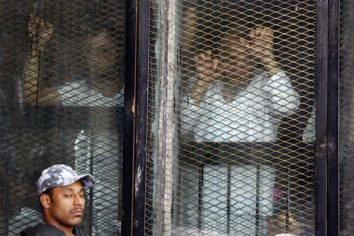 Egypt-court-sentences-75-to-death-for-2013-sit-in.jpg