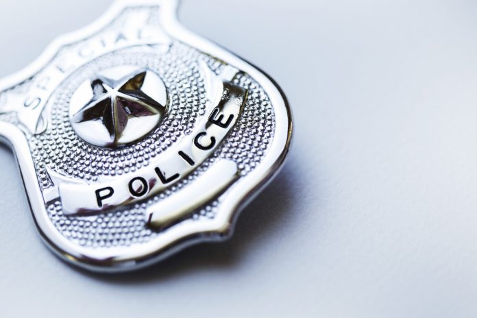 Georgia-police-officers-fired-for-coin-flip-arrest.jpg