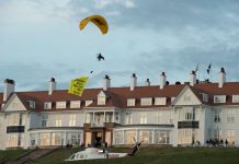 Police searching for protester who paraglided over resort where Trump is staying