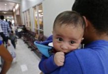 Deadline to reunite US migrants extended as babies face court